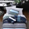 imageNautica  TwinTwin XL Bed Set Reversible Comforter with Matching Shams Bed Sheets and Laundry Bag Dorm Essentials Captains BlueGreenElliot Blue