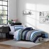 imageNautica  TwinTwin XL Bed Set Reversible Comforter with Matching Shams Bed Sheets and Laundry Bag Dorm Essentials Captains BlueGreenElliot Blue