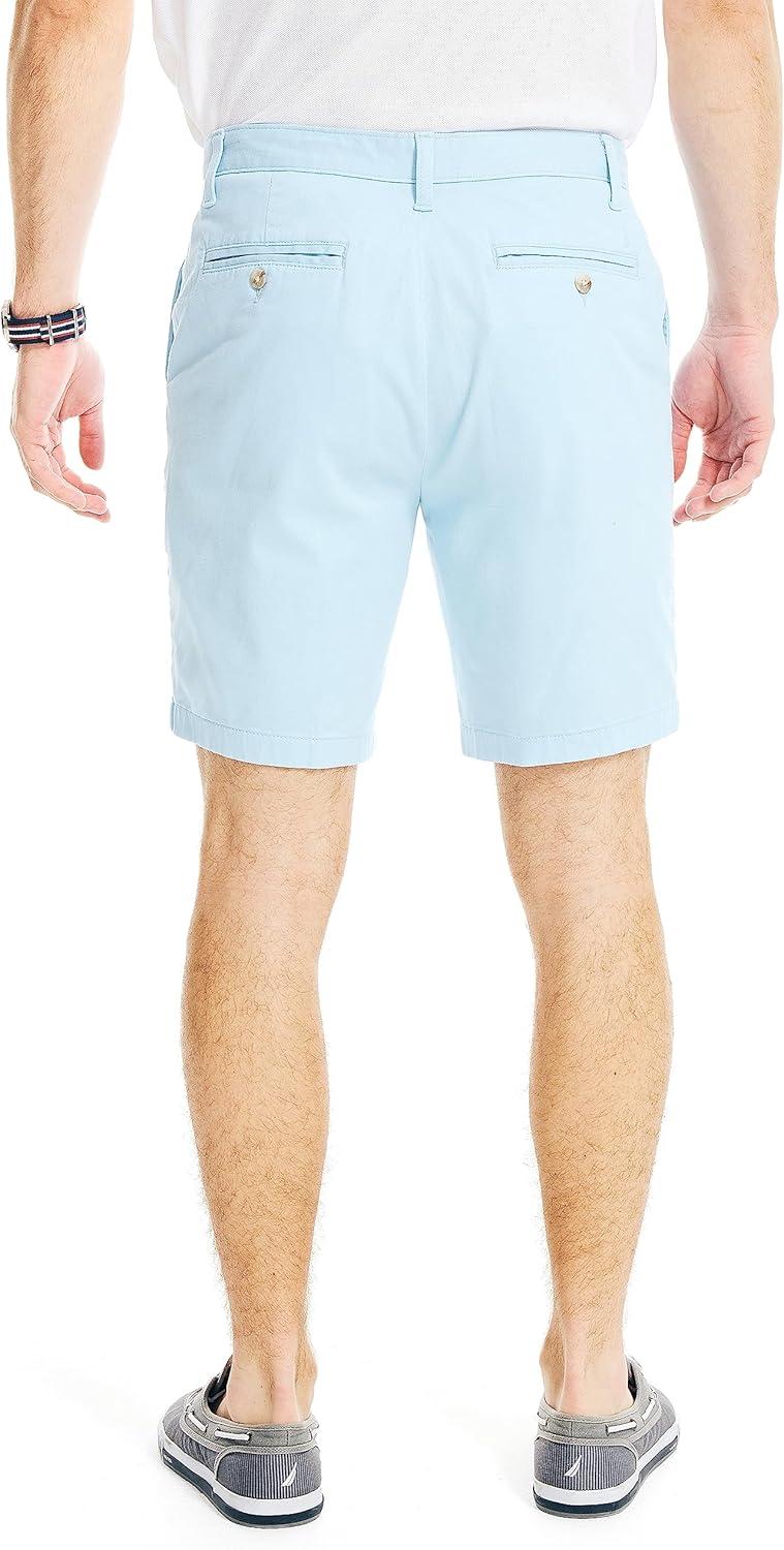 imageNautica Mens Classic Fit Flat Front Stretch Solid Chino 85quot Deck ShortsNoon Blue