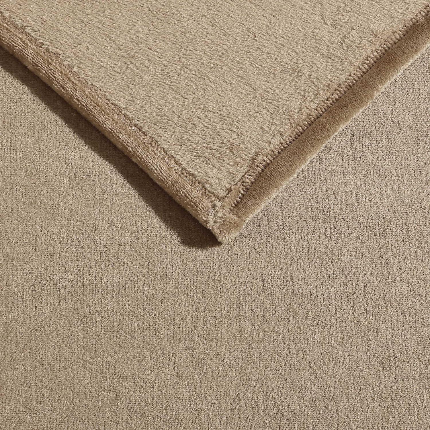 imageNautica  Twin Blanket Soft Plush Fleece Bedding Ideal for Bed or Couch Dorm Essentials OekoTex Certified Solid RedBrown